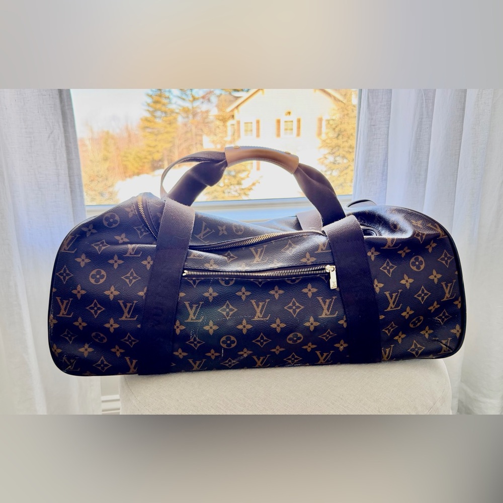 Authentic Louis Vuitton Horizon rolling Duffel Luggage